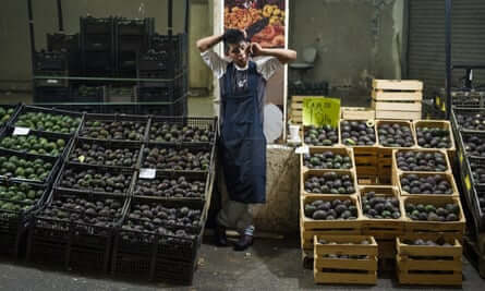 An avocado vendor at a market in Mexico City.